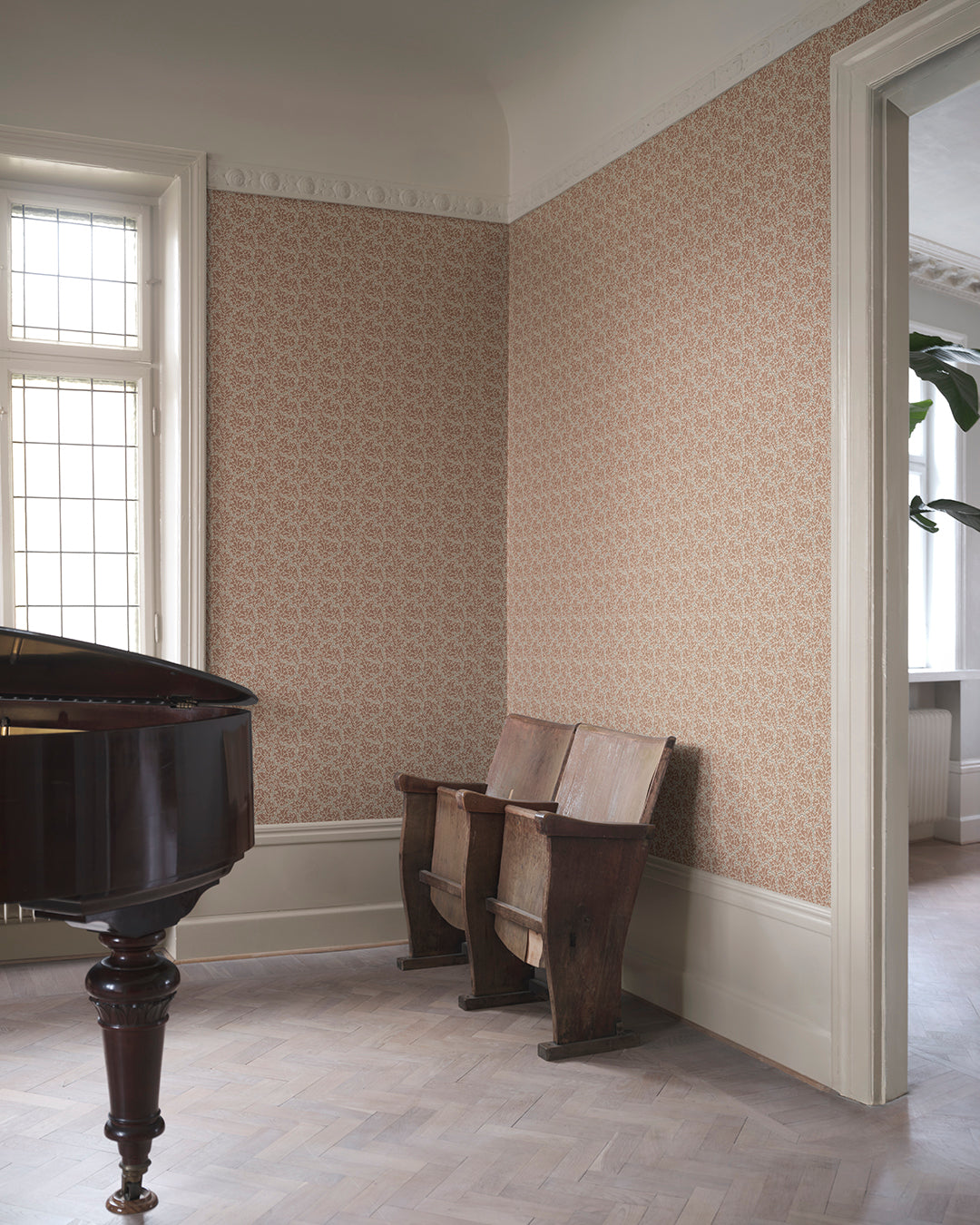 Elegance of Terracotta Coral
This terracotta wallpaper features a rich coral pattern reminiscent of classic Vermicelli motifs. It beautifully combines tradition with a modern twist, adding vibrant elegance to any space.