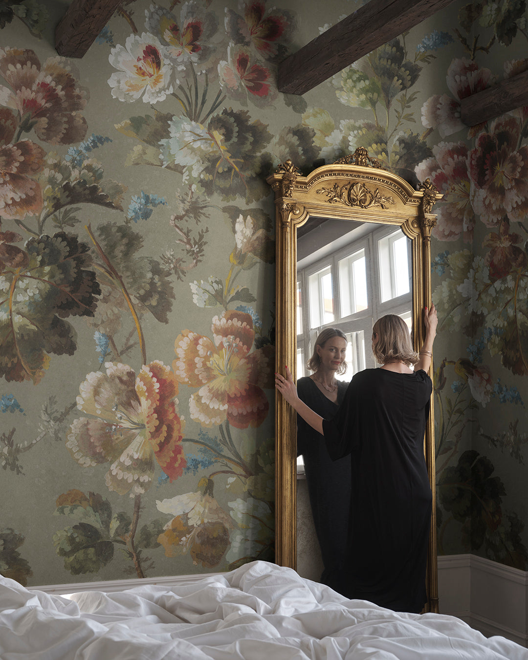 Ines is a beautiful floral cavalcade wallpaper mural in sage green, inspired by 19th-century paintings