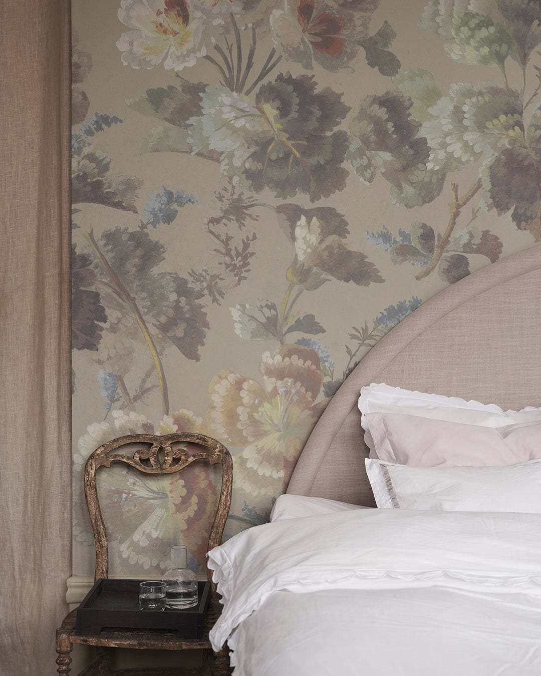 Ines Beige wallpaper mural brings a beautiful floral cavalcade to your walls, echoing 19th-century artistry with a soft palette and painterly style.