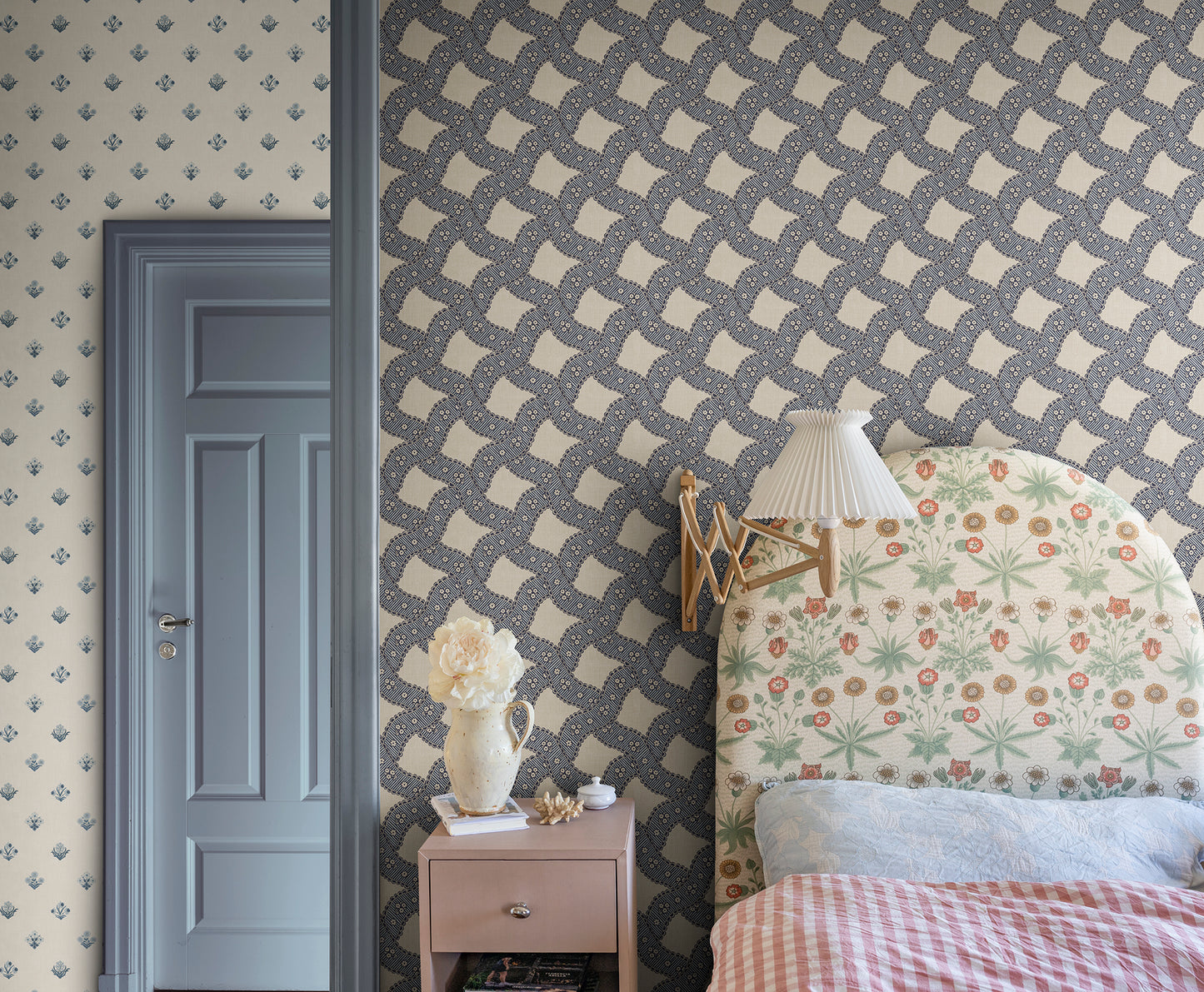 Annie Blue is a delightful medallion wallpaper inspired by 18th-century French design.