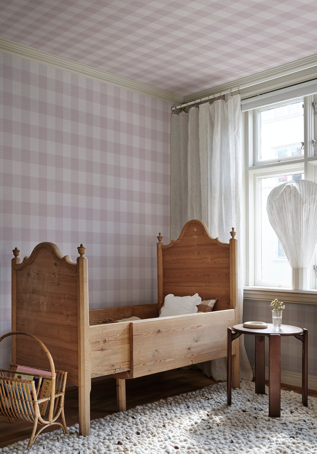 Lykke wallpaper, one of our most beloved checked patterns, is inspired by our textile heritage.