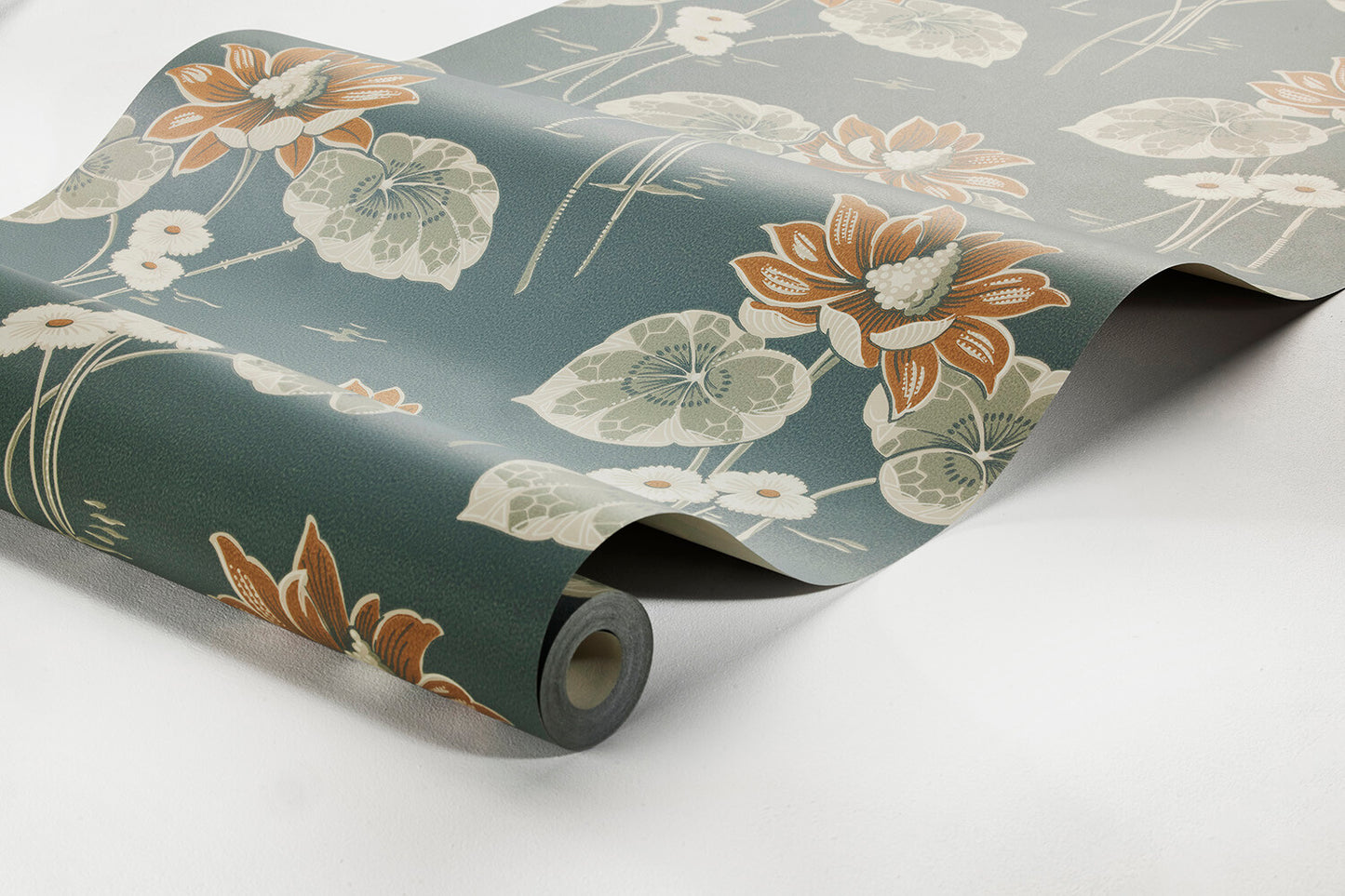 Colored in a sophisticated palette of steel blue, rusty brown and grey tones, our Haga wallpaper is inspired by the youthful designs of the early 20th century.