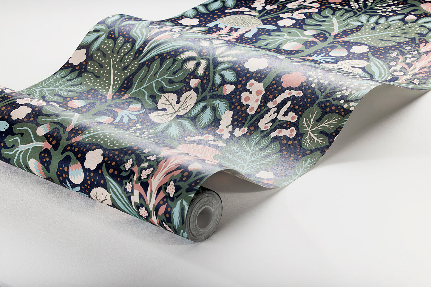 Stylized foliage and peaceful turtles are depicted in the playful and colorful pattern illustrated by celebrated Swedish designer, Hanna Werning.