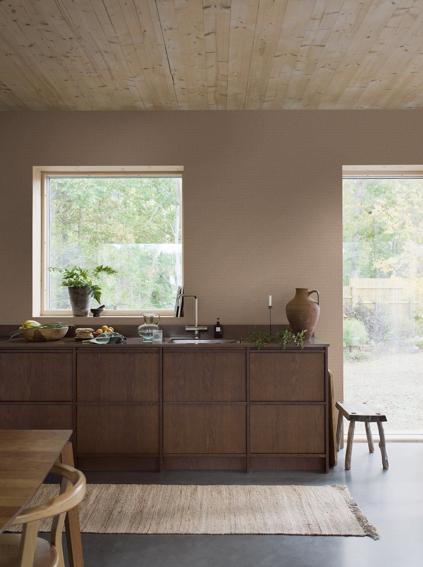 Willowherb wallpaper is simple and rustic. Having the appearance of a single-color surface from a distance, its pretty petite design features a stylized four-petal flower within a diamond trellis pattern.