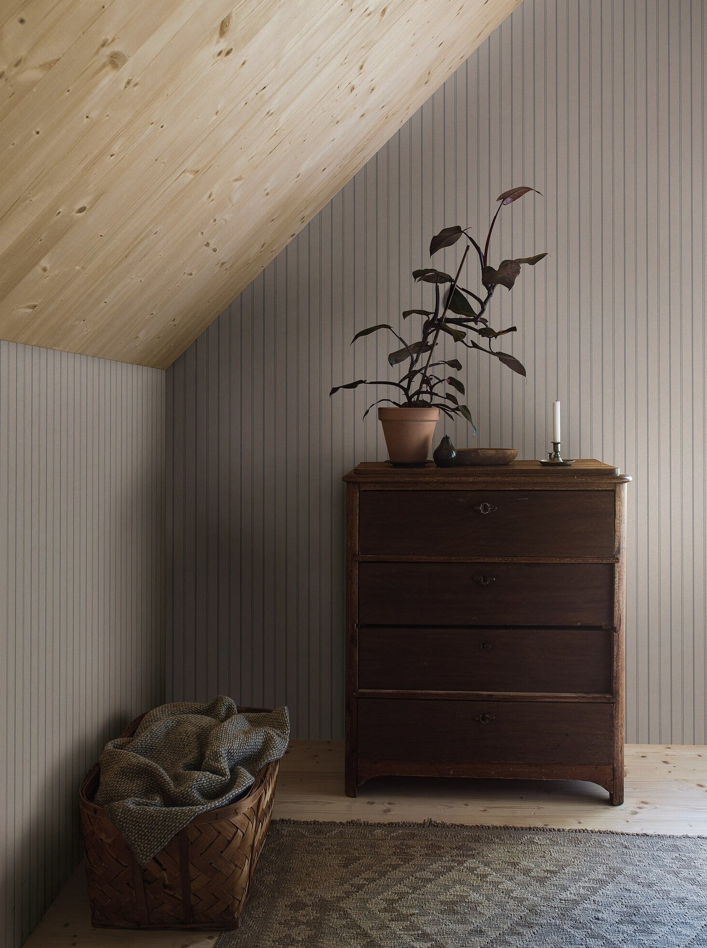 Woodland Stripe wallpaper is printed on our popular linen surface to create a tactile and cosy expression.