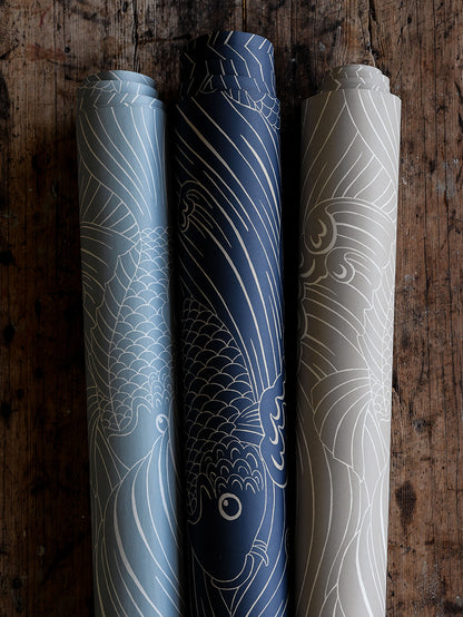 Wallpaper with inspiration from old woodcut techniques, Emma von Brömssen’s seemingly simple design Plenty more fish unveils an intriguing play with lines where fish hide in a wavy sea