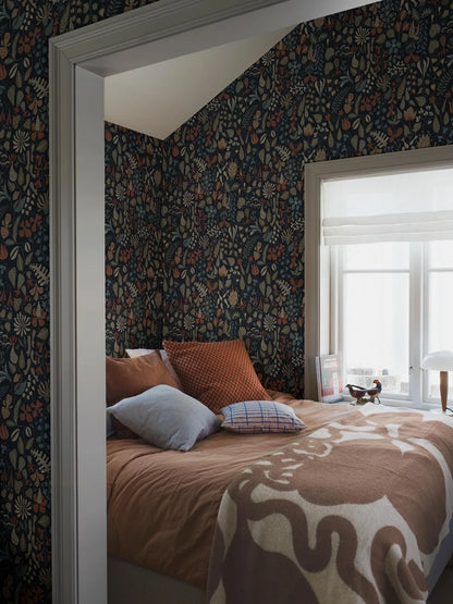 This version of our Herbarium wallpaper has a darker, refined mood with its deep blue backdrop and detailing in tones of terracotta, muted blues, greens, and warm browns.