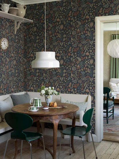 This version of our Herbarium wallpaper has a darker, refined mood with its deep blue backdrop and detailing in tones of terracotta, muted blues, greens, and warm browns.