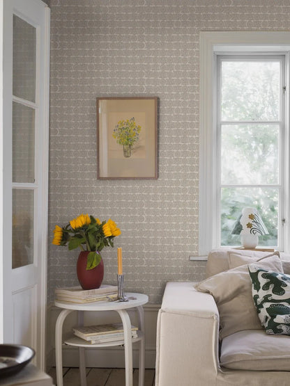  Soft and sophisticated, our Astrid wallpaper in subtle blue and beige tones creates a warm, textile effect that feels both natural and refined. 