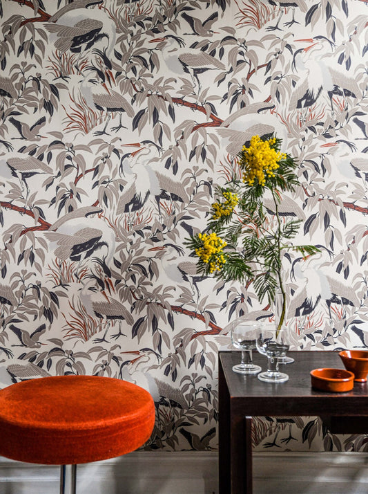 A rhythmic play with formations encouraging the eye to look for the hidden birds in the pattern of this wallpaper.
