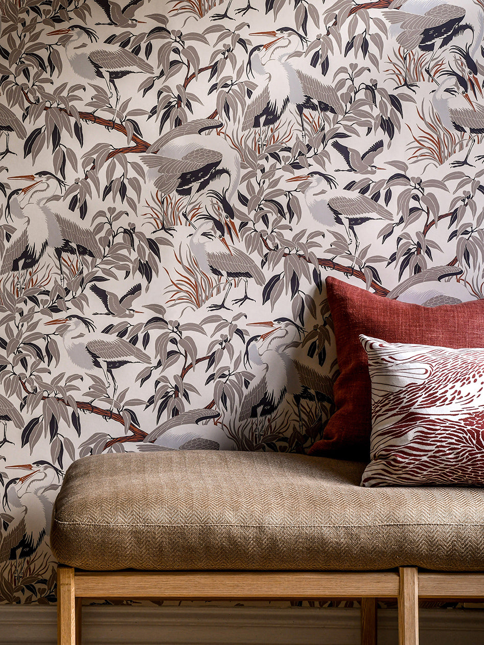 A rhythmic play with formations encouraging the eye to look for the hidden birds in the pattern of this wallpaper.