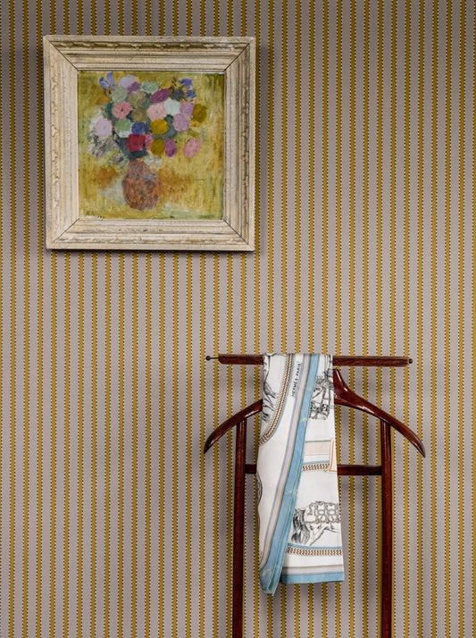 With inspiration from hand tacked textiles the ’stitches’ gives an edge to the stripes in this wallpaper design.