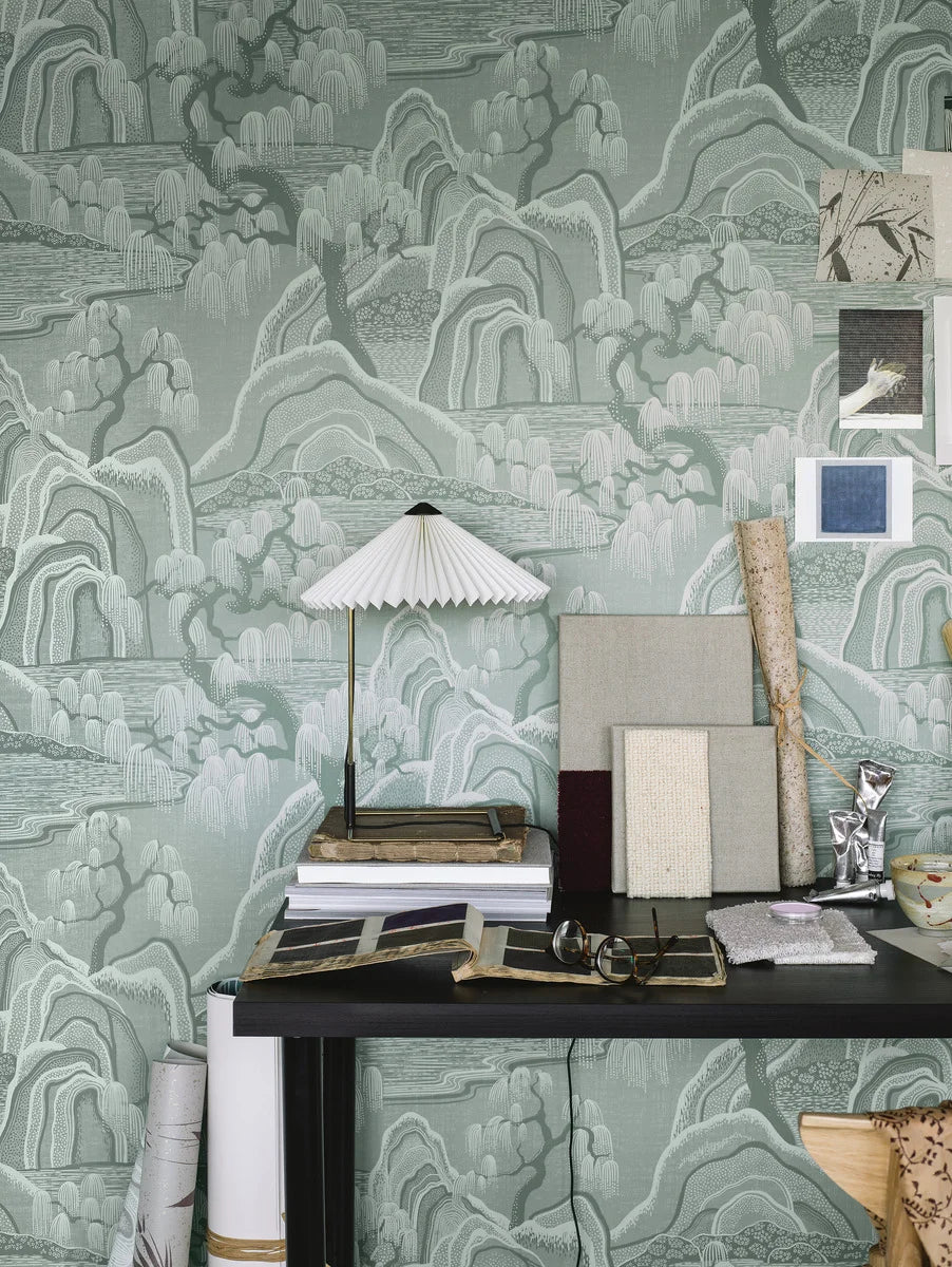 Featuring an intricate, hand-painted print from Noomi Spange, our Indigo Garden wallpaper in green creates a timelessly lovely interior for you to enjoy. 