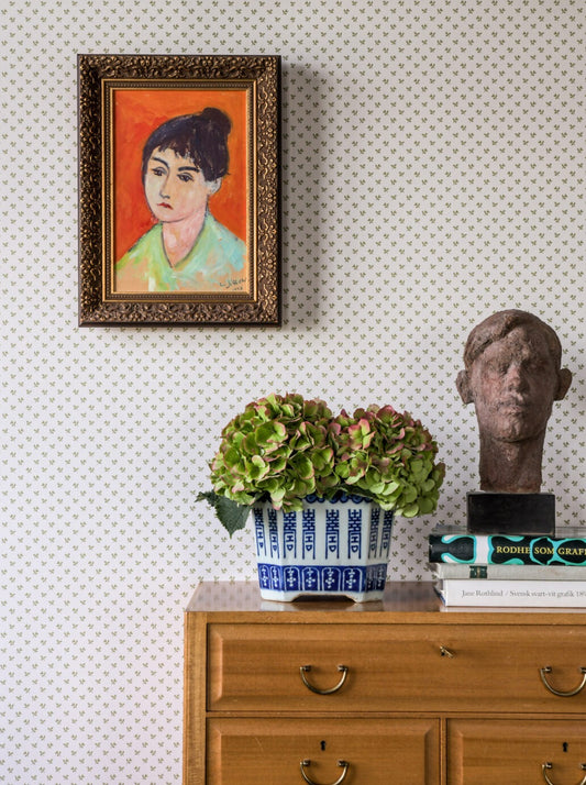Initially intended for a larger scale, this design took an unexpected turn for the better when we opted to go in the opposite direction, making the flower-like forms very tiny. The result was a charming resemblance to woven fabric.<br>