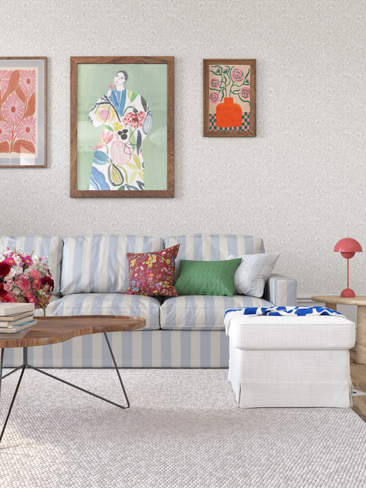 Emma is a timeless wallpaper pattern where flowers and leaves gently wind across the surface, creating a soft, blossoming feel on the wall. 