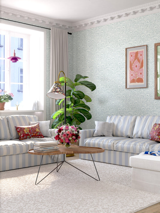 Emma is a timeless wallpaper pattern where flowers and leaves gently wind across the surface, creating a soft, blossoming feel on the wall. 
