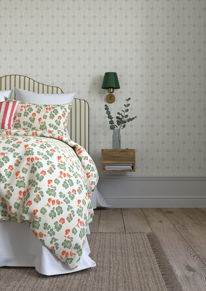 The beautiful Hedvig is both an organic and graphic wallpaper pattern. Small, stylized hand-painted bouquets are connected by swirling leaves, forming a harmonious and symmetrical whole.