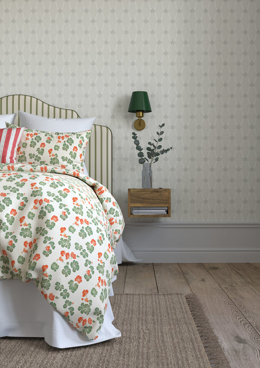 The beautiful Hedvig is both an organic and graphic wallpaper pattern. Small, stylized hand-painted bouquets are connected by swirling leaves, forming a harmonious and symmetrical whole.