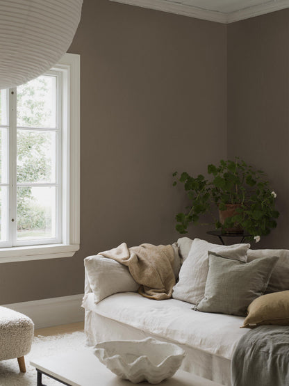 Hazelnut Linen comes in a medium-dark Brown shade that brings a sense of warmth, comfort, and natural depth to the room. 