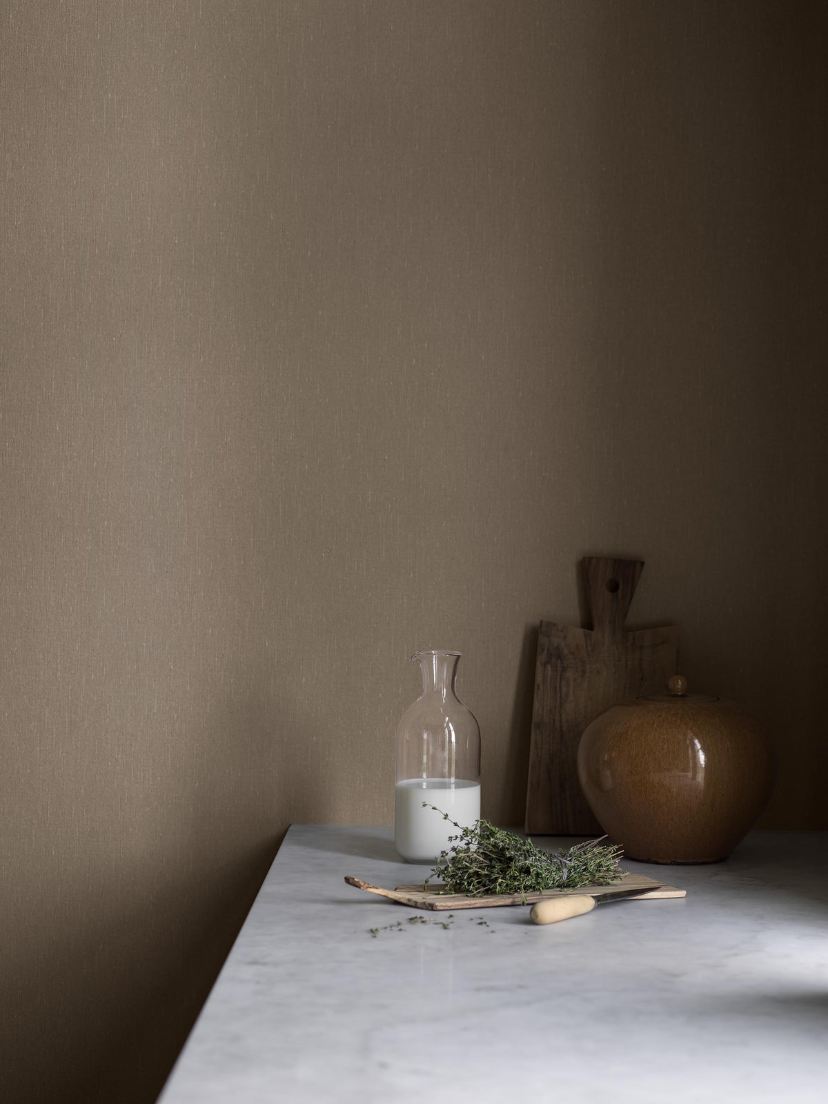  Hazelnut Linen comes in a medium-dark Brown shade that brings a sense of warmth, comfort, and natural depth to the room. 