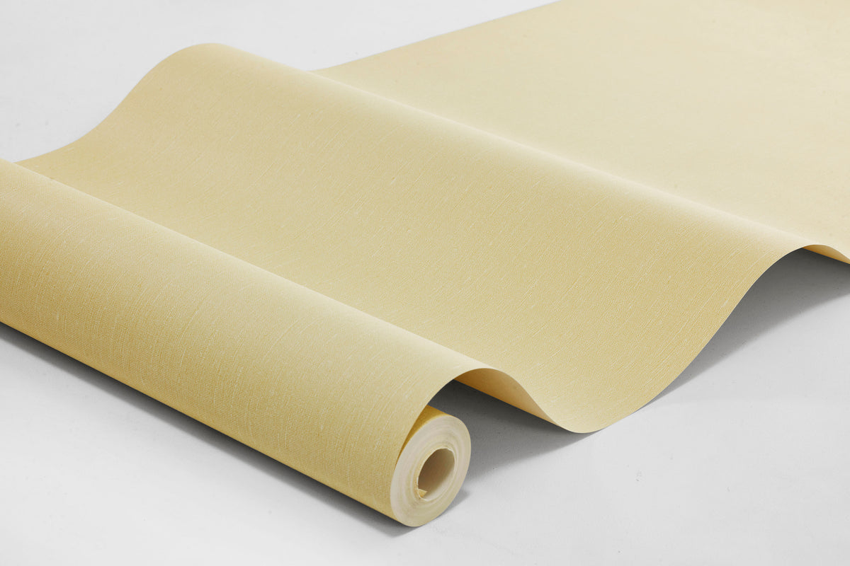  Sunshine Linen is a soft, light yellow wallpaper that evokes the feeling of a beautiful summer day. The wallpaper is printed with a tactile linen texture that adds depth to the colour and creates a lively, cosy expression. 