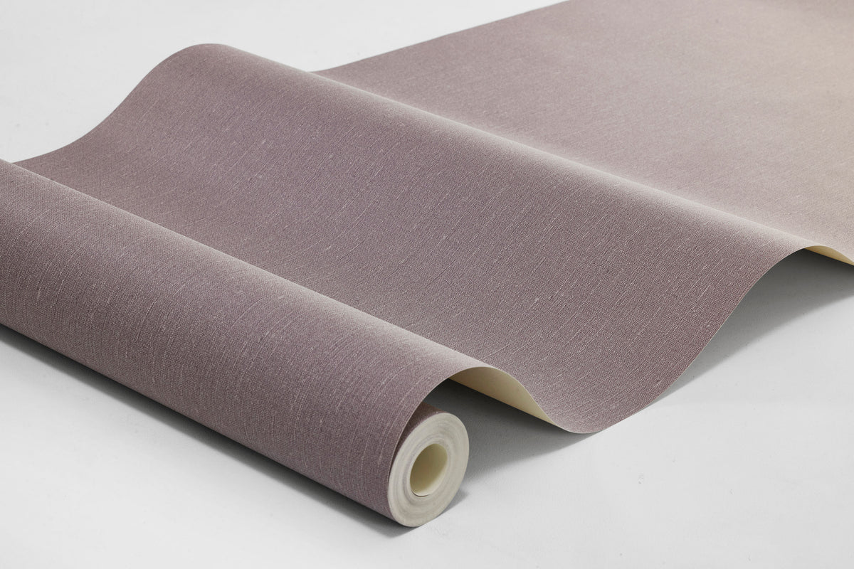 Lilac Linen is a softly muted Purple wallpaper with a warm undertone that evokes blooming lilacs. The subtle linen texture gives the surface a lively expression and a soft, textile feel.