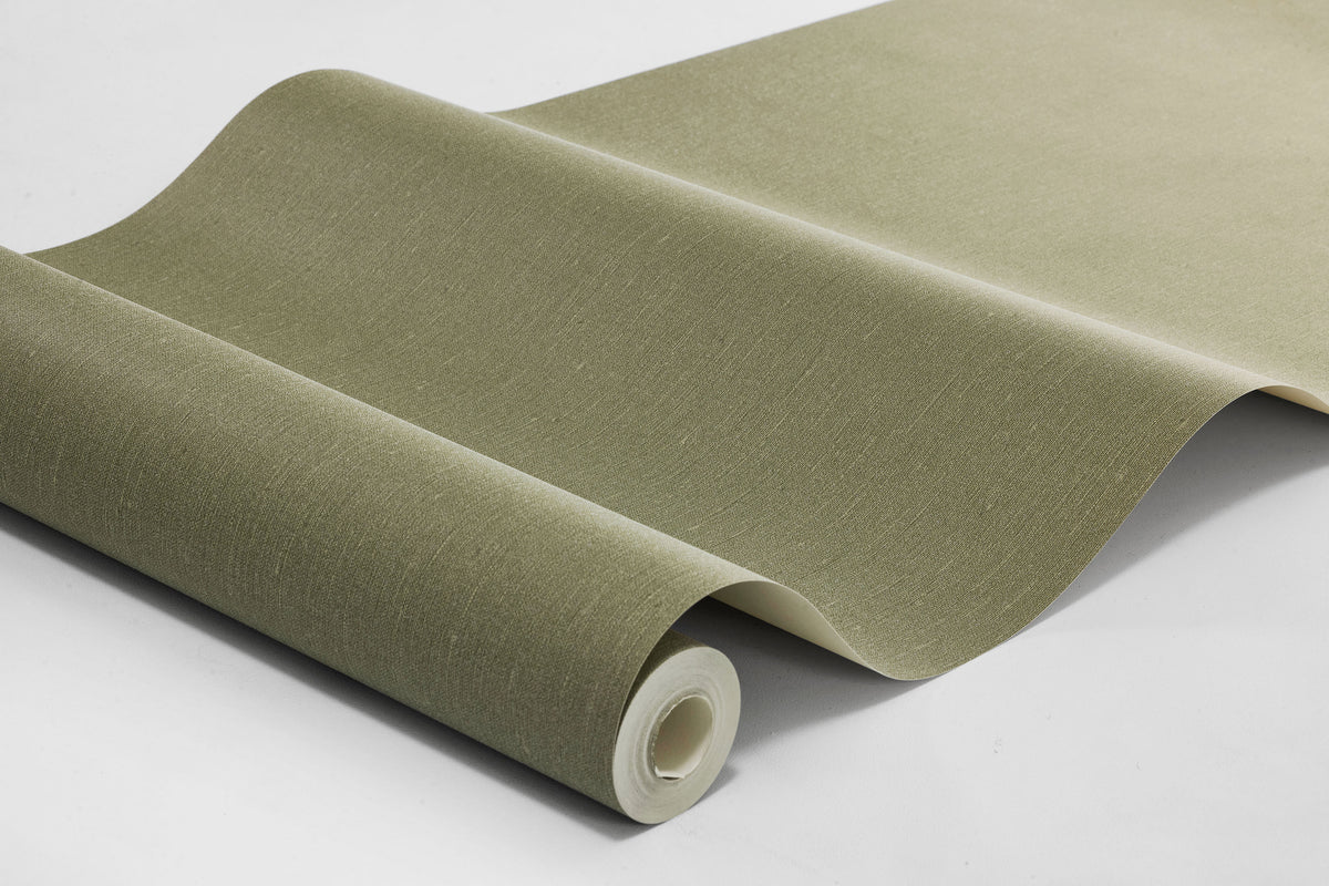 Deep Olive comes in a deep, muted olive-green shade that gives the room a calm, earthy feel. The subtle linen texture brings the Solid color wallpaper to life and adds a soft, sophisticated character.