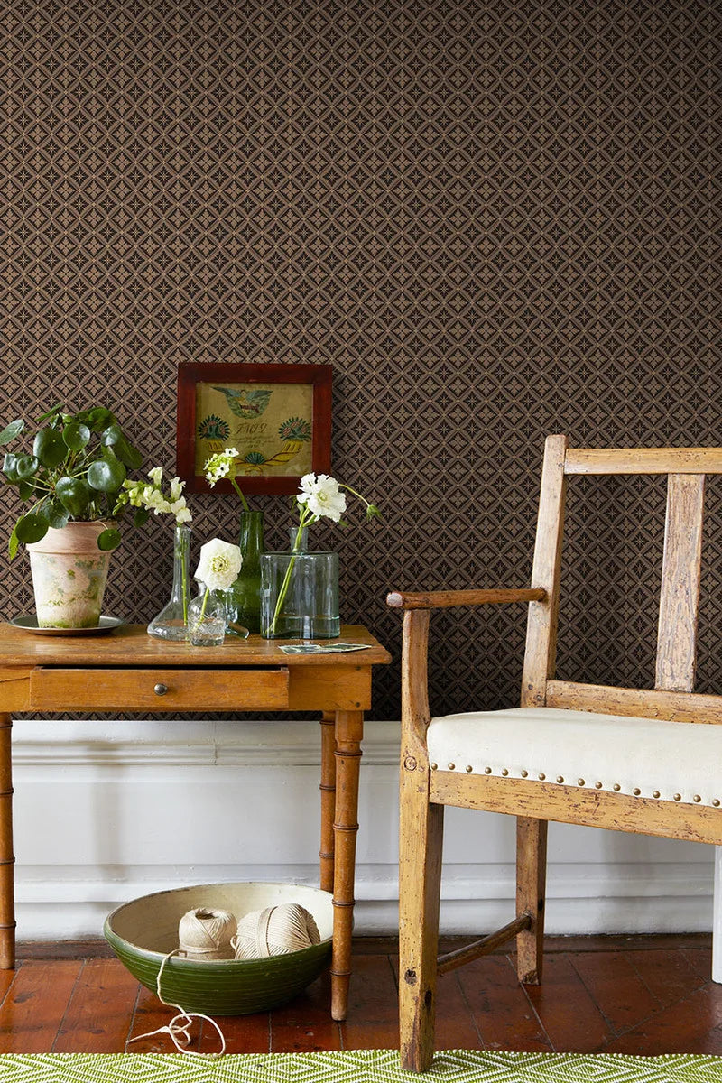 Embellished with stylized flowers rendered in varying shades of black, brown, and beige, our Loka wallpaper is simple yet stylish, with a subtle, understated elegance that makes it the perfect backdrop for contemporary interior aesthetics.