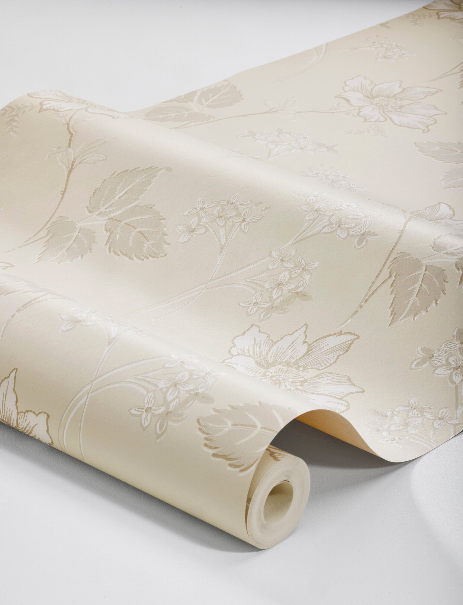 Celebrate the everyday beauty of our Valborg wallpaper in mild neutral tones of brown and grey.