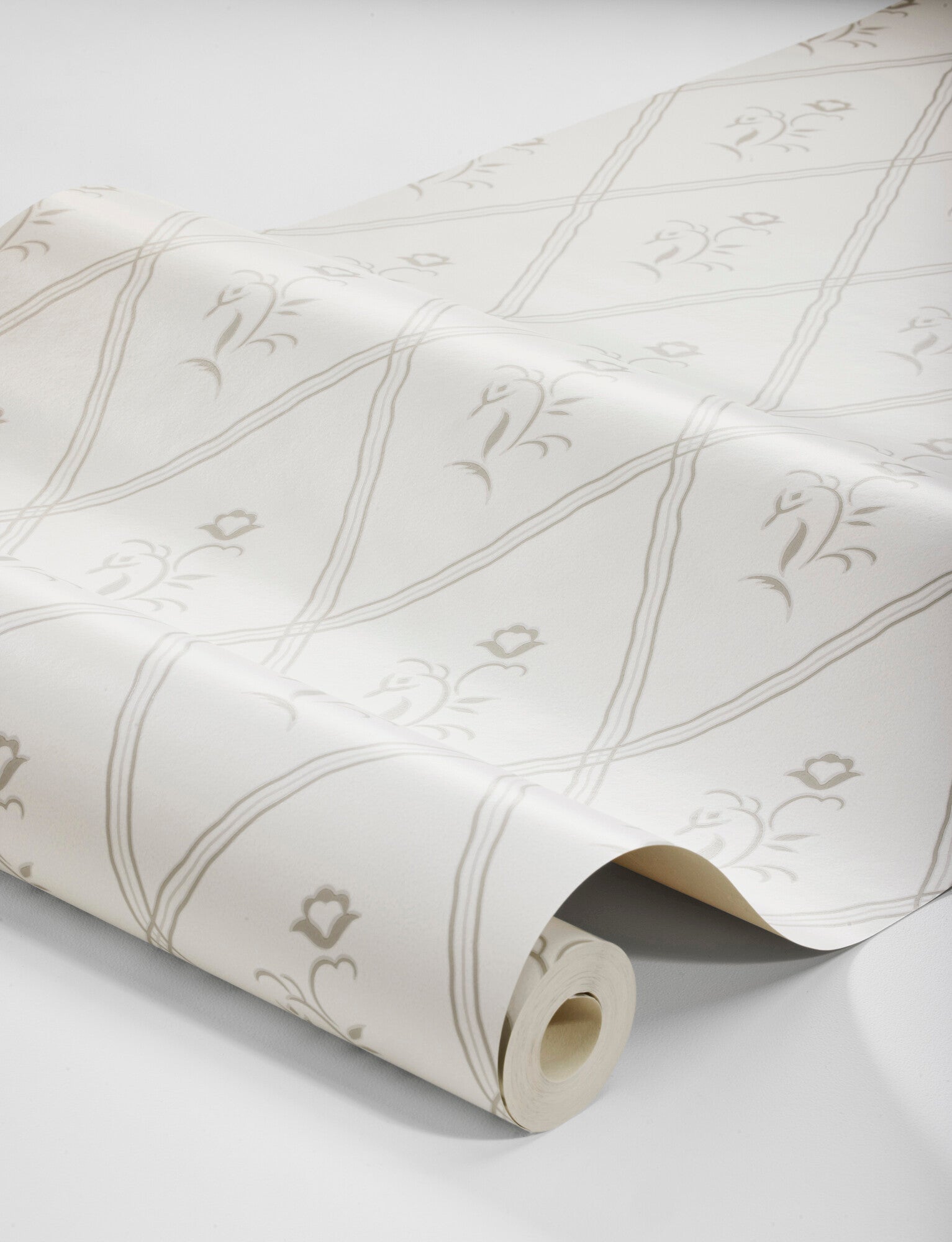 Classic and beautiful, our Signe wallpaper is colored in gray detailing on a white background.