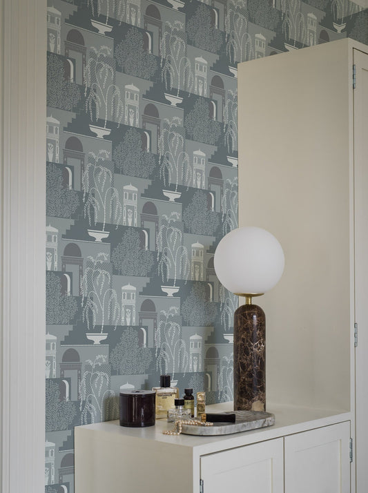Dive into the serene beauty of our Mimi wallpaper in contrasting tones of grey-blue and white-grey. 