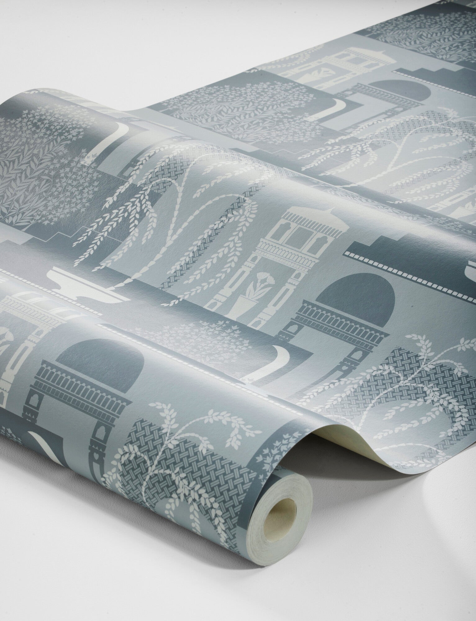 Dive into the serene beauty of our Mimi wallpaper in contrasting tones of grey-blue and white-grey. 