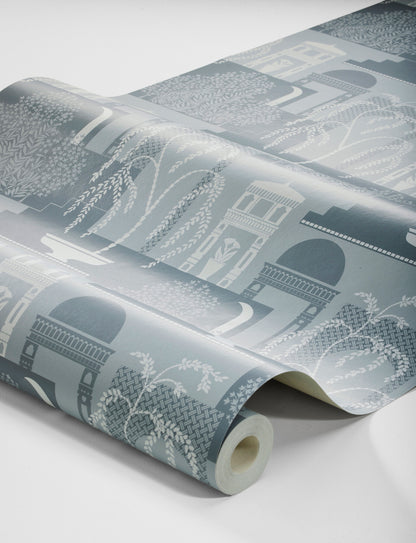 Dive into the serene beauty of our Mimi wallpaper in contrasting tones of grey-blue and white-grey. 