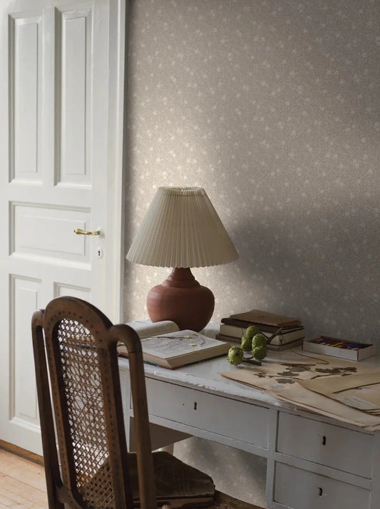 Embrace the understated beauty of our Myrten wallpaper in a beautiful beige color scheme