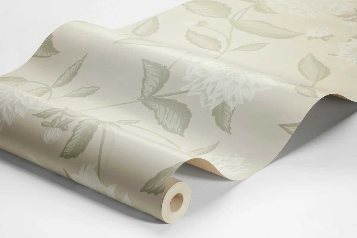 Embrace the timeless beauty of our Dahliadröm wallpaper in a lovely palette of ivory and green on a warm beige background. 