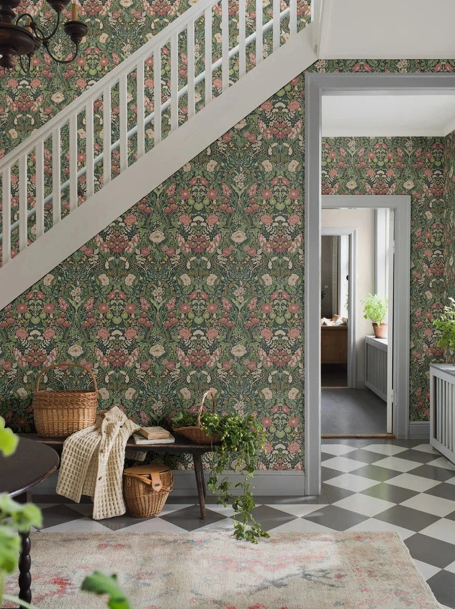 Experience the freshness and vibrancy of our Örtagård wallpaper in vivid and playful tones of muted light pink, green, and yellow on a striking black background. 