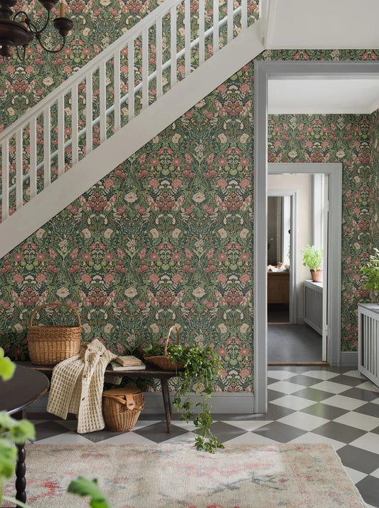 Experience the freshness and vibrancy of our Örtagård wallpaper in vivid and playful tones of muted light pink, green, and yellow on a striking black background. 