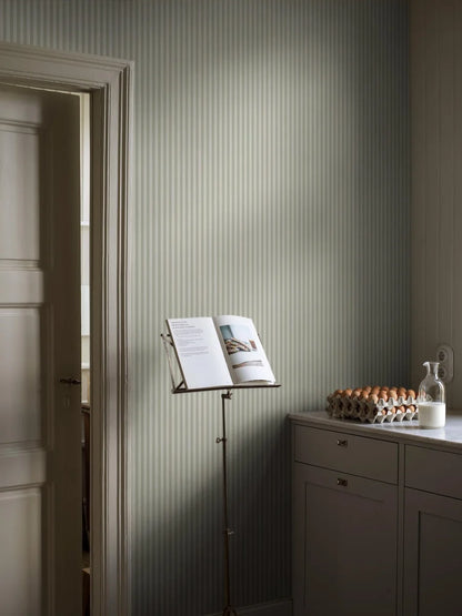  Mölle Stripe is a striped wallpaper inspired by the classic Swedish seaside town of Mölle in Skåne – known for its free-spirited bathing culture at the turn of the 20th century. 