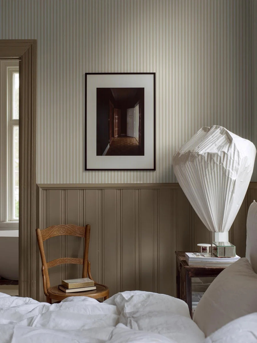 Mölle Stripe is a striped wallpaper inspired by the classic Swedish seaside town of Mölle in Skåne – known for its free-spirited bathing culture at the turn of the 20th century.