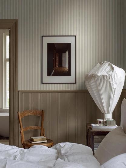 Mölle Stripe is a striped wallpaper inspired by the classic Swedish seaside town of Mölle in Skåne – known for its free-spirited bathing culture at the turn of the 20th century.