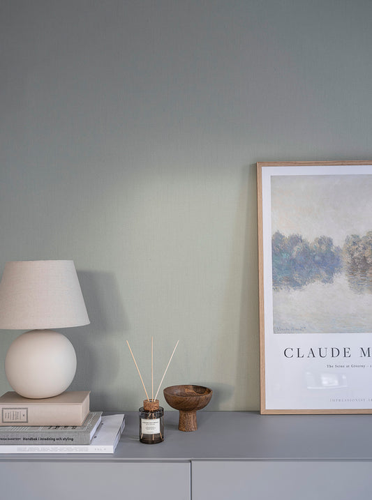  Cotton is a plain wallpaper with a woven appearance like a cotton fabric. 