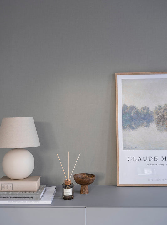  Cotton is a plain wallpaper with a woven appearance like a cotton fabric. 
