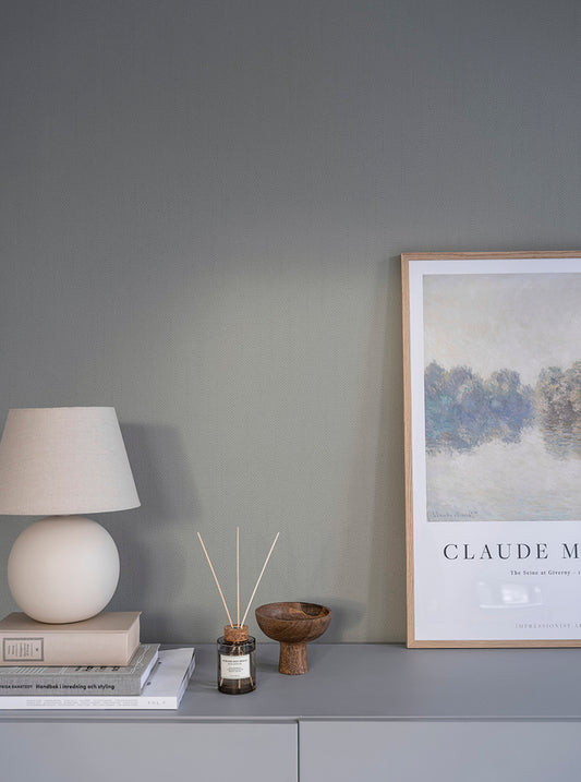  Cotton is a plain wallpaper with a woven appearance like a cotton fabric. 