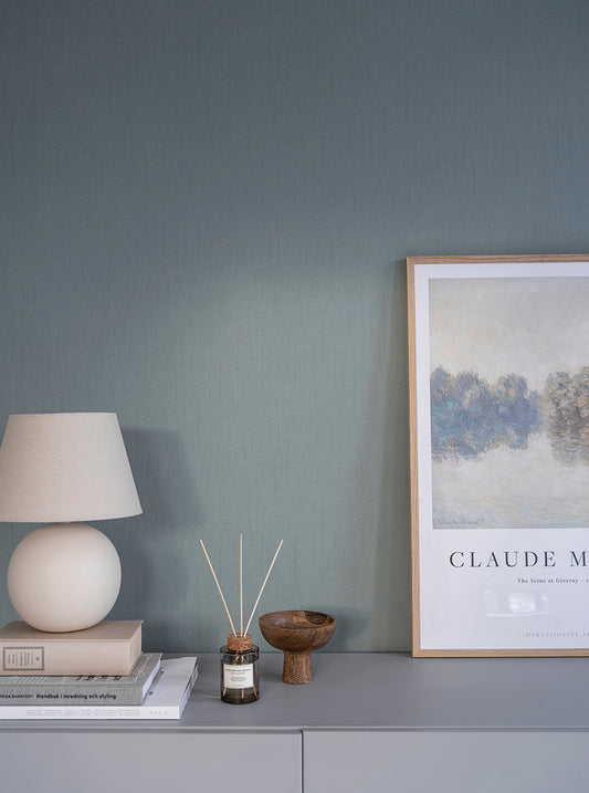  Cotton is a plain wallpaper with a woven appearance like a cotton fabric. 