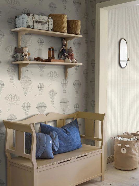 Colored in natural and pastel tones of grey and beige, our Up in the Sky children’s wallpaper creates a timeless and neutral backdrop.