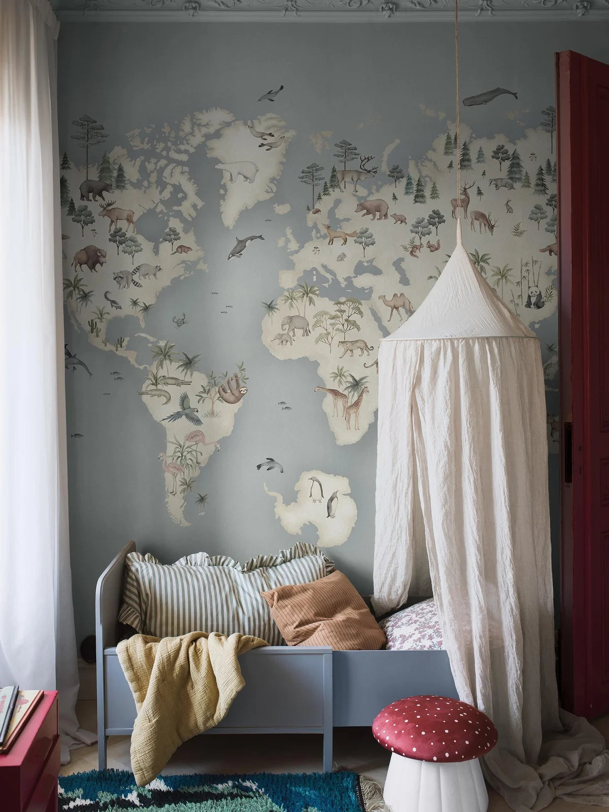 Our Little Explorer Mural children’s wallpaper in a palette of grey-blue and natural beige tones is a captivating adventure for your young explorer