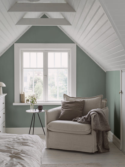 Sea Breeze is a powdery grey-green wallpaper with soft hints of blue that give the color a cool, poetic expression.