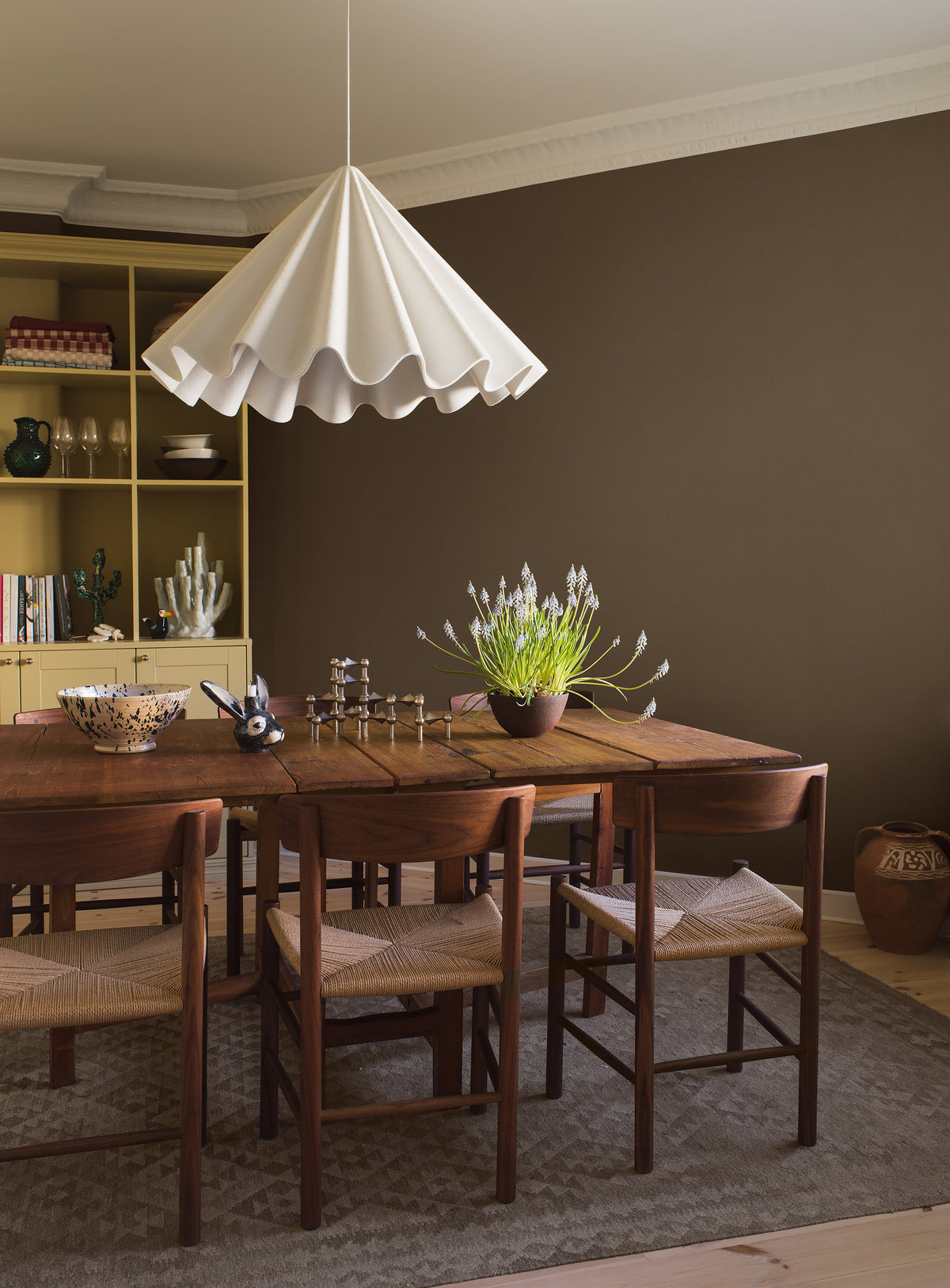  Earth Sand is a rich dark brown wallpaper inspired by natural earth pigments. 