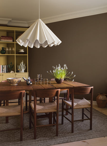 Earth Sand is a rich dark brown wallpaper inspired by natural earth pigments. 