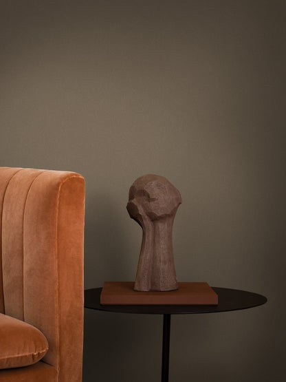  Earth Sand is a rich dark brown wallpaper inspired by natural earth pigments. 